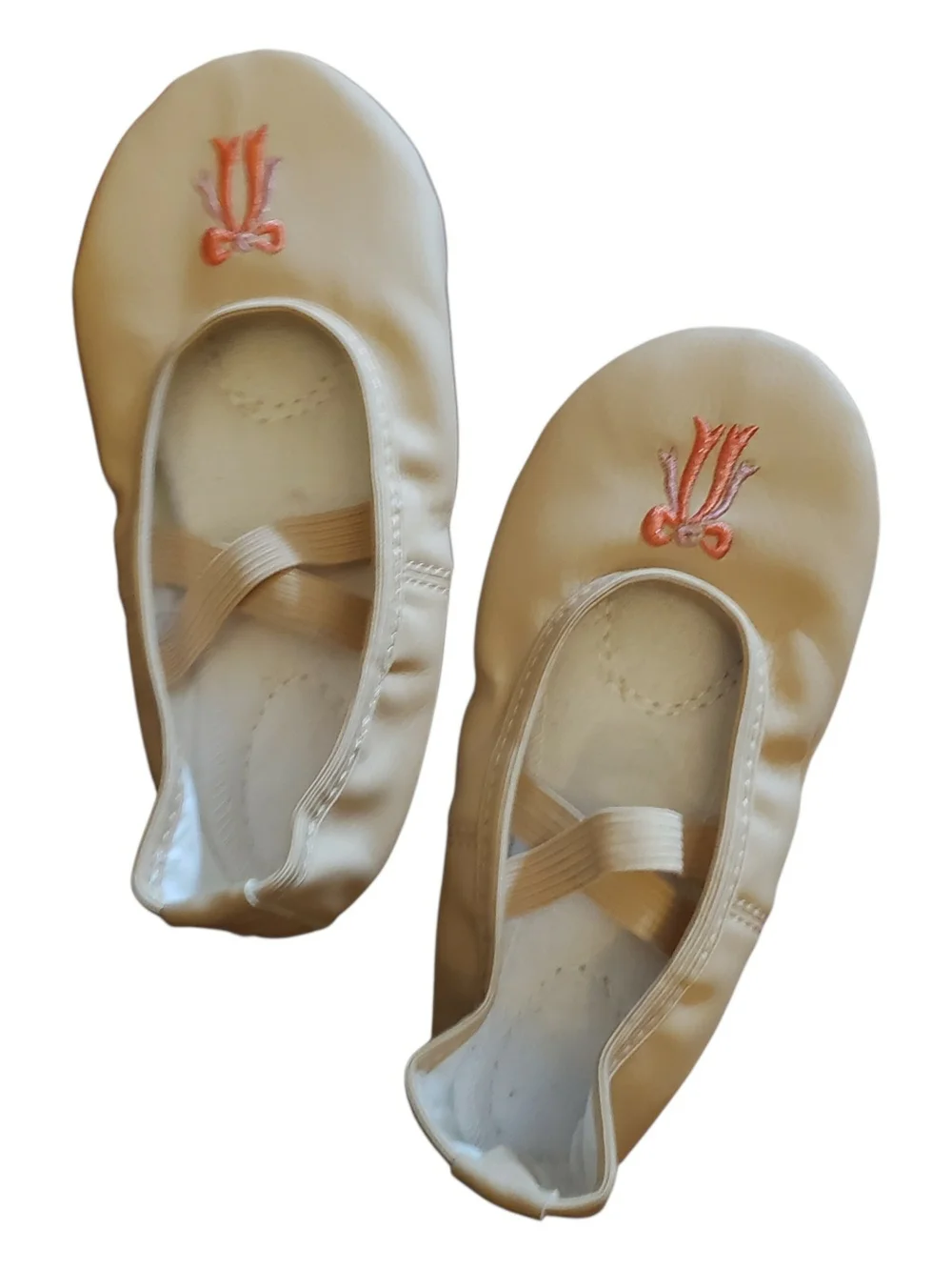 US size 12 girls cream ballet flats with pink embroidered detail.